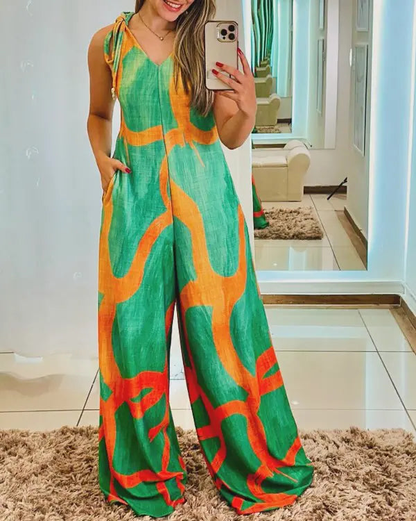 Lily | Floral Print V-Neck Lace-Up Shoulder Jumpsuit with Pockets & Wide Leg Romper
